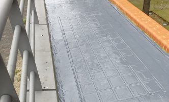 Overcapping Defective Skylights with Liquid Rubber